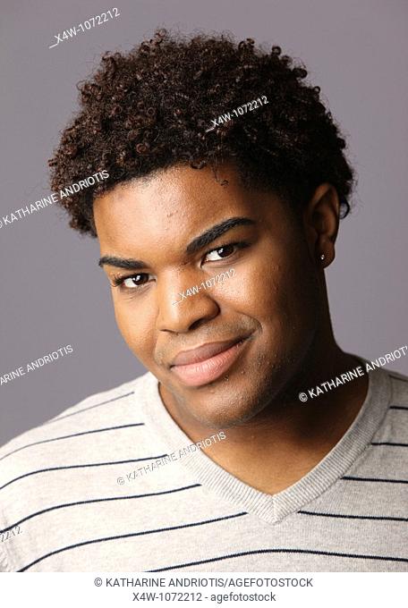 Young African-American man posing for portrait