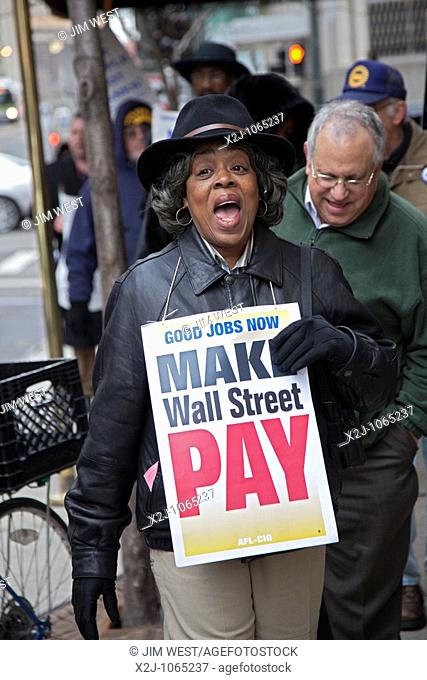 Detroit, Michigan - Union members picket the Bank of America, saying that big Wall Street banks should pay the cost of creating good jobs to solve the economic...