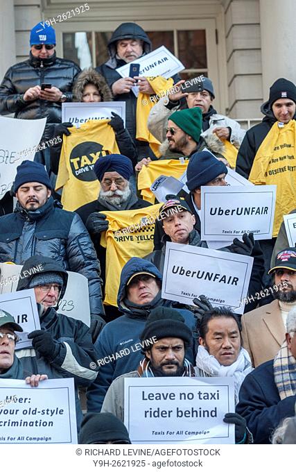 Wheelchair advocates joined by taxi and livery drivers rally on the steps of New York City Hall against the City Council's Uber legislative package as it fails...