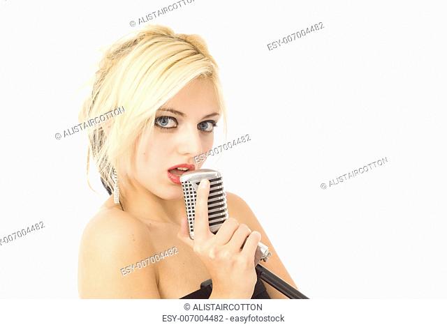 Pretty woman or girl music singer with microphone isolated on white