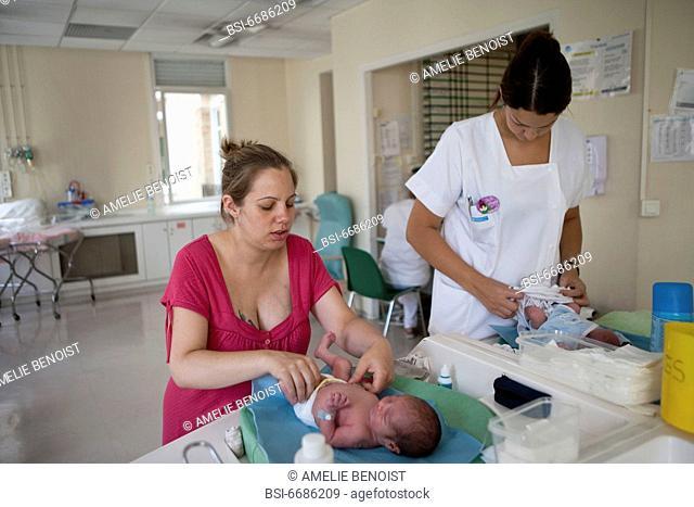 Photo essay at the maternity of the Diaconesses hospital in the 12th district of Paris, France. 4-day-old newborn baby boy twins