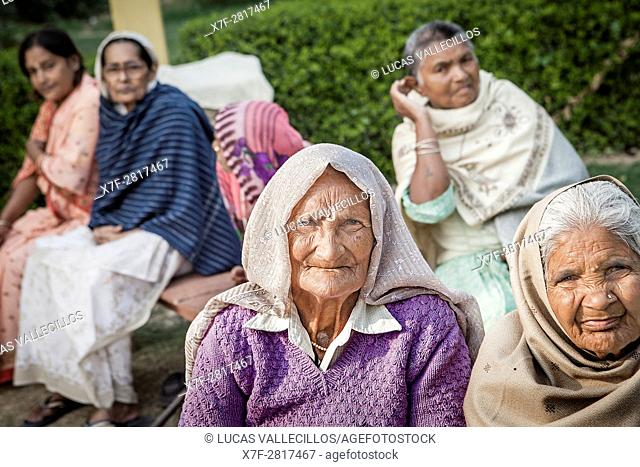 Group of Widows, in Ma Dham ashram for Widows of the NGO Guild for Service, Vrindavan, Mathura district, India