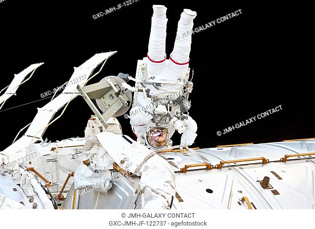NASA astronaut Rick Mastracchio, STS-131 mission specialist, participates in the mission's first session of extravehicular activity (EVA) as construction and...