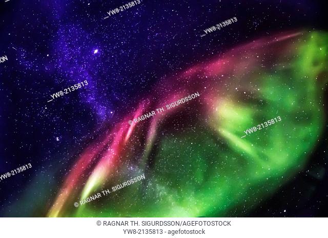 Starry evening with the Aurora Borealis or Northern Lights and the Milky Way Galaxy, Abisko, Lapland, Sweden
