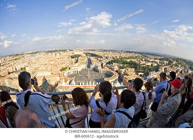Tourists enjoying the view from the dome of St. Peter's Basilica, Rome, Italy, Europe