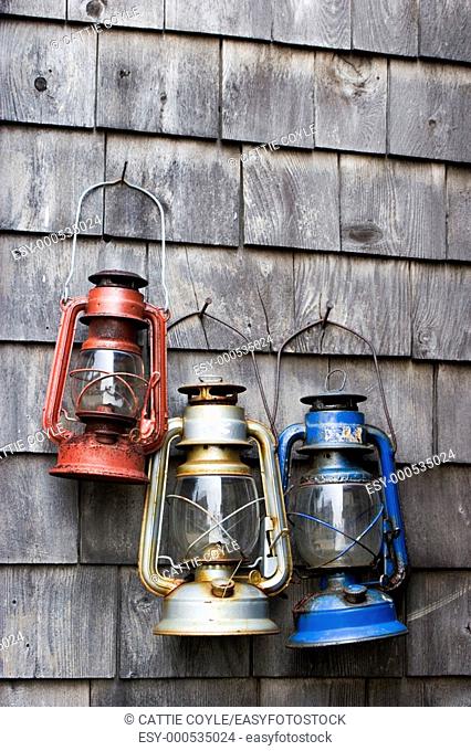 Lanterns hanging on a wall in Rockport, MA