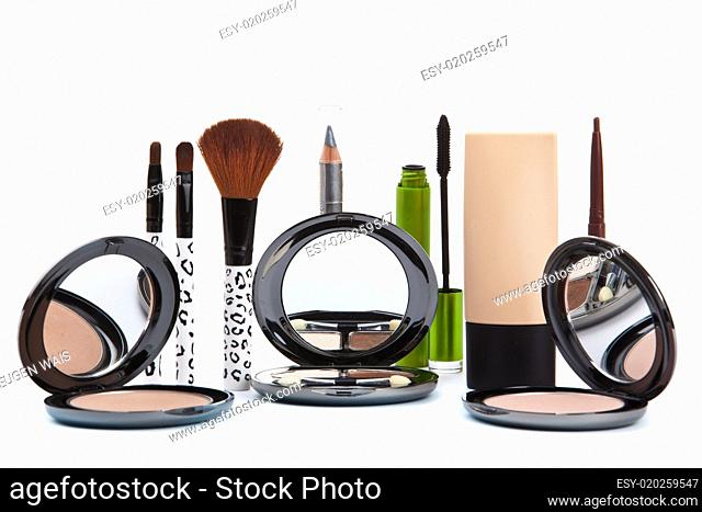 Various cosmetics isolated over white. Makeup products