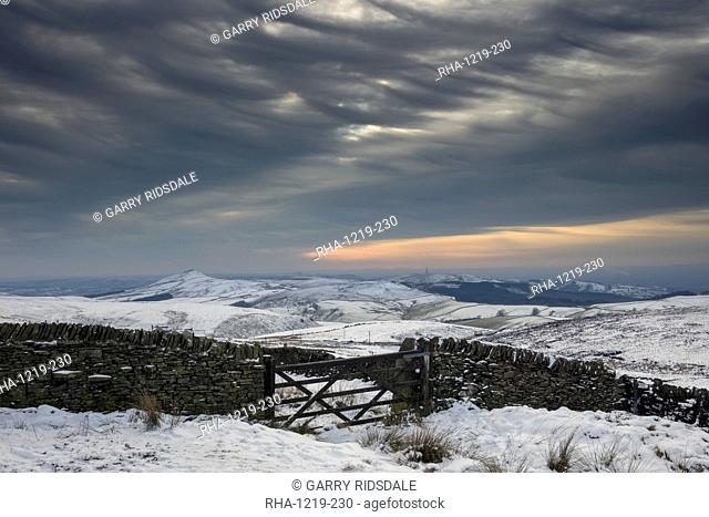 Winter afternoon in the snow covered Peak District looking across the White Peak to Shutlingsloe, Cheshire, England, United Kingdom, Europe