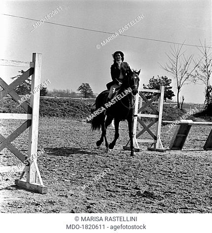 Brazilian actress Florinda Bolkan, Florinda Soares Bulcão's stage name, rides a horse at the riding stables of Tor di Quinto; after having worked for a...