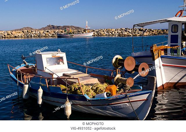 Boats in harbor with fishing ships of Naoussa in quiet island of Paros in the Greek Islands of Greece Europe - 13/11/2007