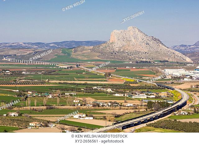 near Antequera, Malaga Province, Andalusia, southern Spain. Fields just outside the town with La Peña de los Enamorados, (Lovers' Rock) or Montaña del Indio...