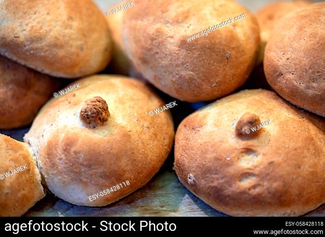 Warm and fresh homemade bread rolls. Food background