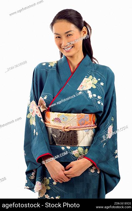 Smiling Japanese woman in traditional clothes of Kimono full length portrait isolated over white background