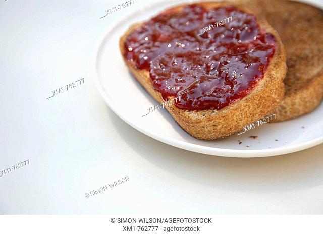 A plate of toast and jam