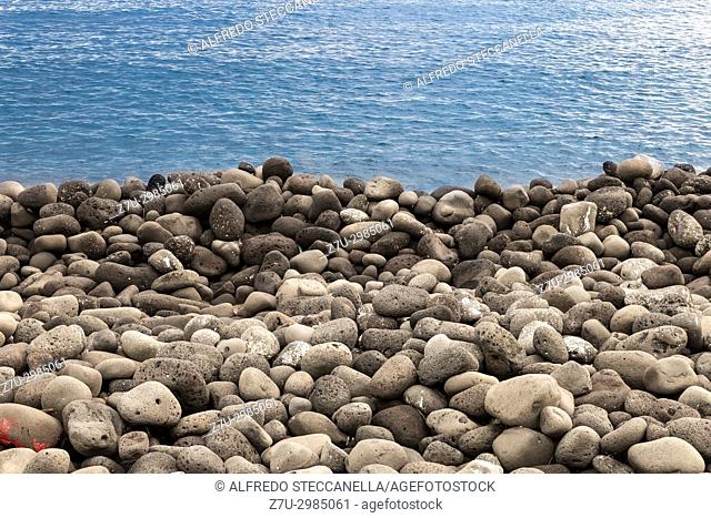 Sicily - Catania: Volcanic rock beach and sea- ideal for backgrounds