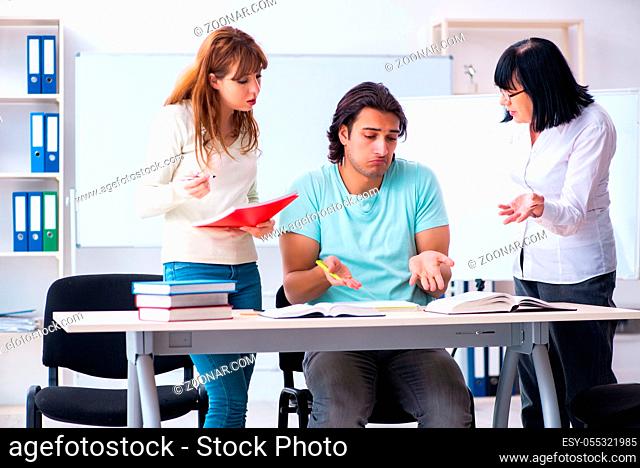 The old teacher and students in the classroom