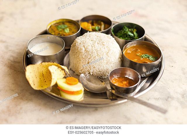 Vegetarian Nepali Thali (Dal Bhat) set, a traditional meal with rice and pulses in Nepal