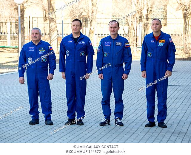 At the Cosmonaut Hotel crew quarters in Baikonur, Kazakhstan, the Expedition 51 prime and backup crewmembers attend flag-raising ceremonies April 7 as part of...