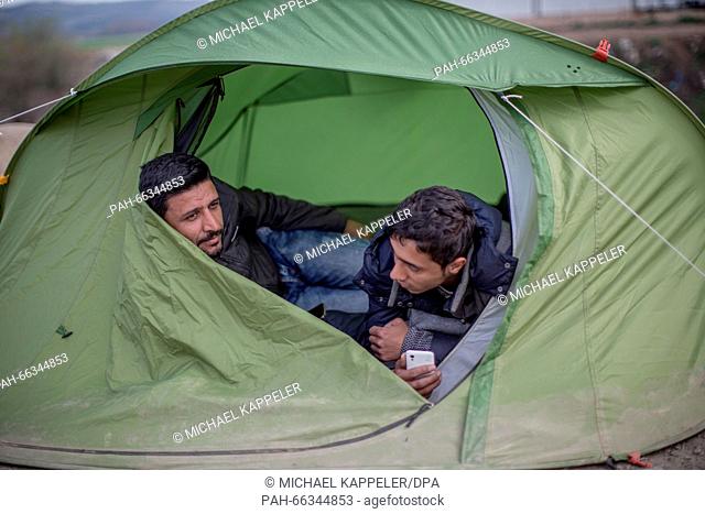 Refugees waiting in their tent at the refugee camp at the border between Greece and Macedonia, in Idomeni, Greece, 2 March 2016