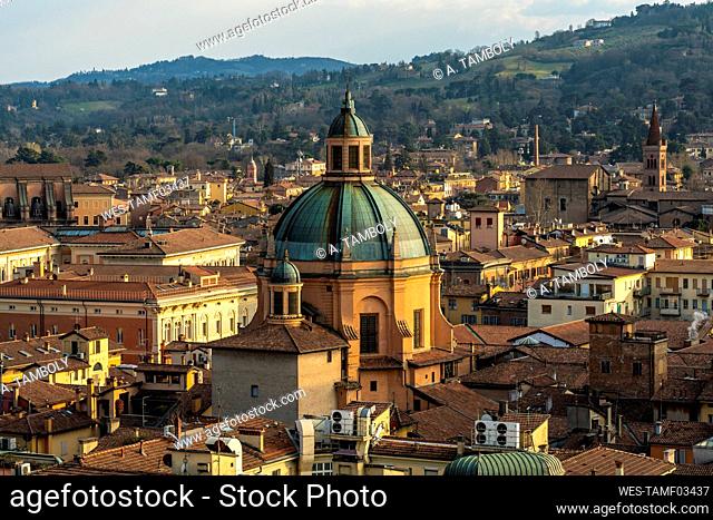 Italy, Emilia-Romagna, Bologna, Dome of Sanctuary of Santa Maria Della Vita and surrounding old town buildings