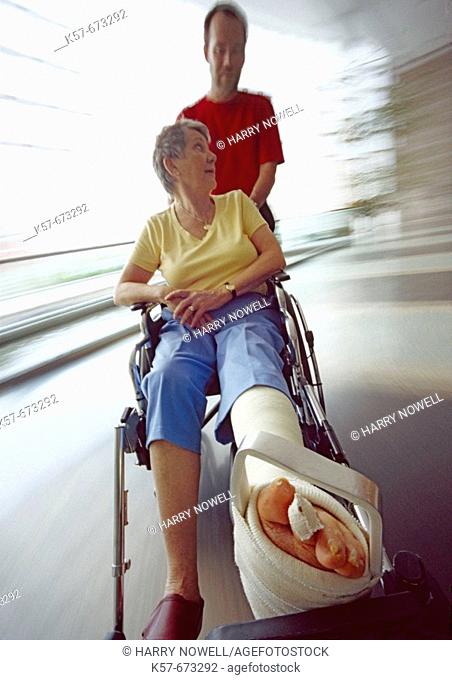 Senior woman recovering in a hospital wheelchair