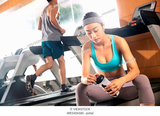Young people in the gym to work out
