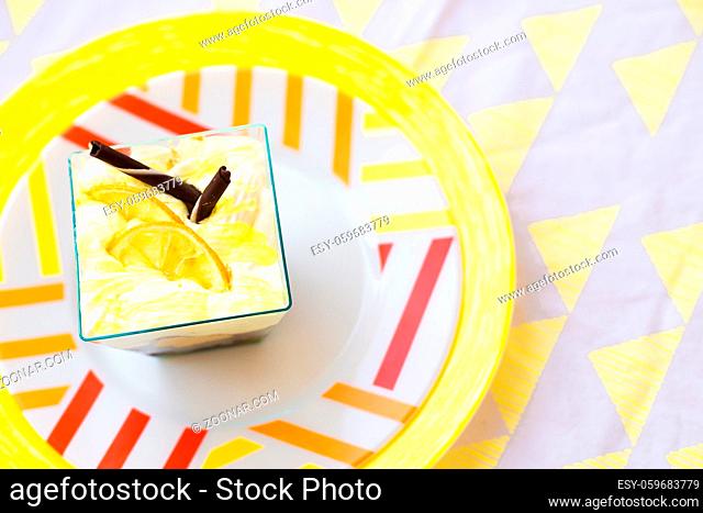 dessert plate and the color yellow napkin, close-up