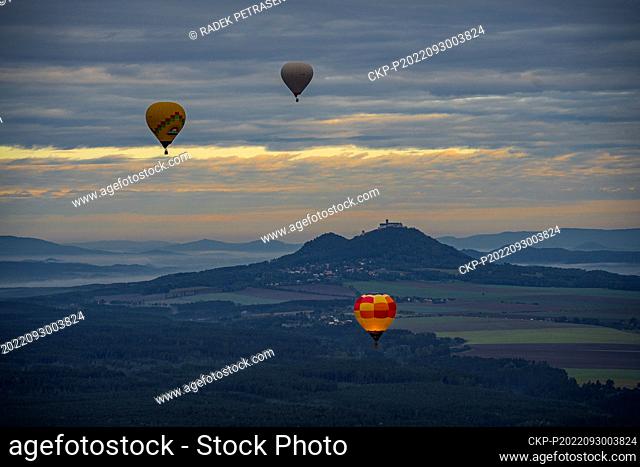 Hot air balloons fly over Bezdez castle within meeting of pilots and owners of hot air balloons, on September 30, 2022, near Bela pod Bezdezem, Czech Republic