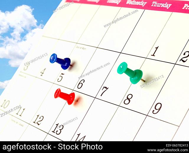 Closeup of Calendar Page with Marked Important Days