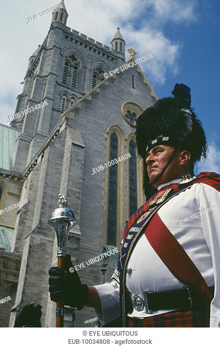 Pipe band Major in front of the Cathedral