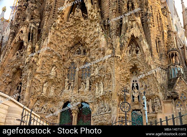 basicila and expiatory church of the holy family, known as sagrada familia at sunset in barcelona. the antoni gaudi masterpiece has become a unesco world...