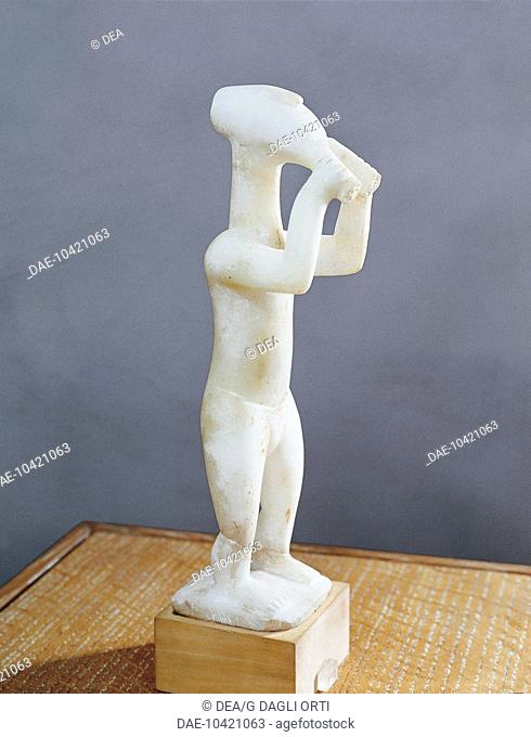 Cycladic civilization, 2nd millenium b.C. Statue of a double flute player. From the Island of Keros (Greece).  Athens, Ethnikó Arheologikó Moussío (National...