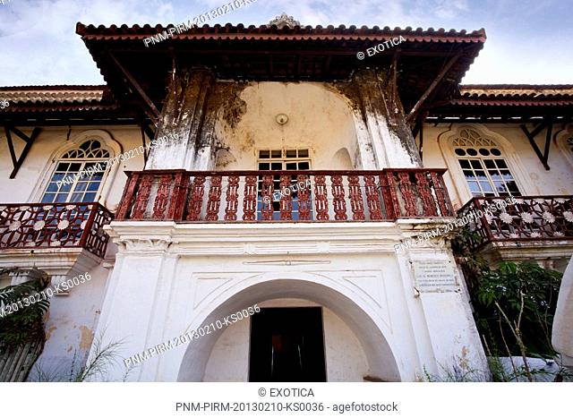 Low angle view of facade of a house, Menezes Braganza House, Chandor, Salcetta, South Goa, Goa, India