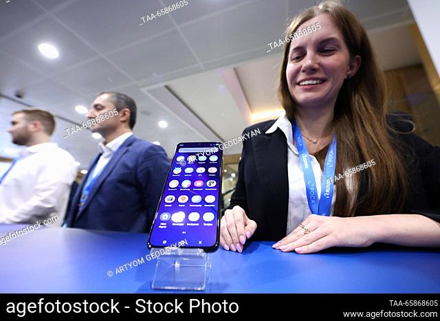 RUSSIA, MOSCOW - DECEMBER 18, 2023: The Russian smartphone R-Phone with the Rosa Mobile operating system is seen during the official presentation at the media...