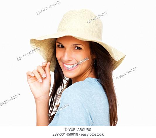 Head shot of pretty woman holding onto brim of hat