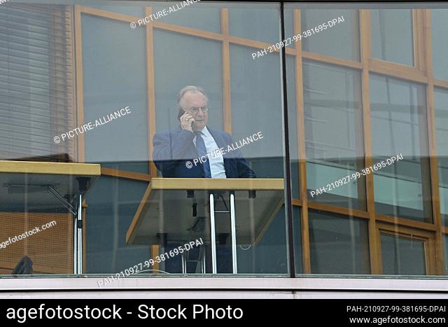 27 September 2021, Berlin: The Minister President of Saxony-Anhalt, Reiner Haseloff (CDU), talks on the phone at the Konrad Adenauer House after the party's...