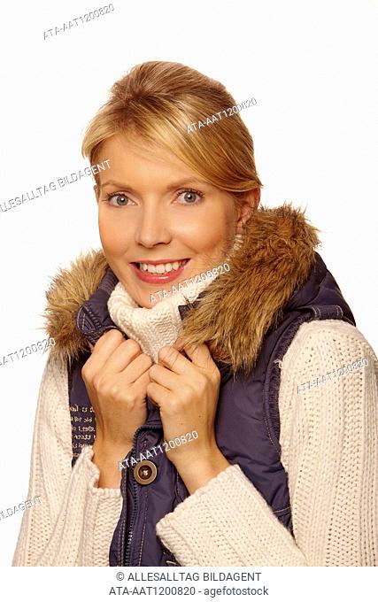 Portrait of a woman wearing a vest