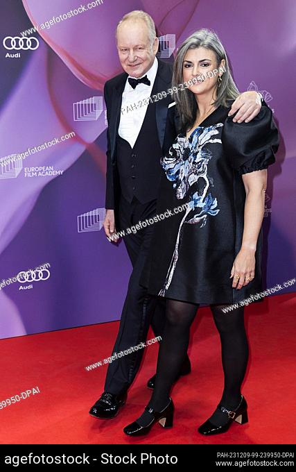 09 December 2023, Berlin: Stellan Skarsgard, actor, attends the European Film Awards ceremony with his wife Megan Everett