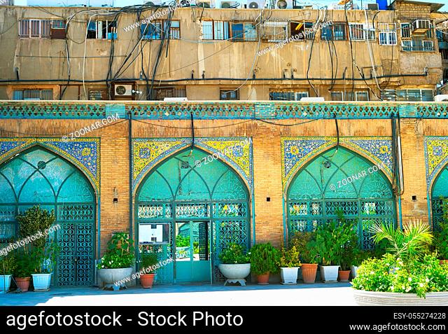 Contrast of modern building exterior with air conditions and traditional mosaic facade, Tehran Grand Bazaar, Iran