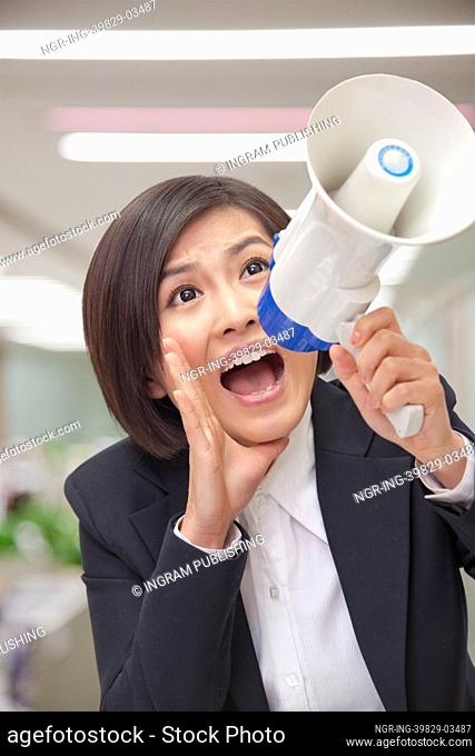 Young Businesswoman with Megaphone