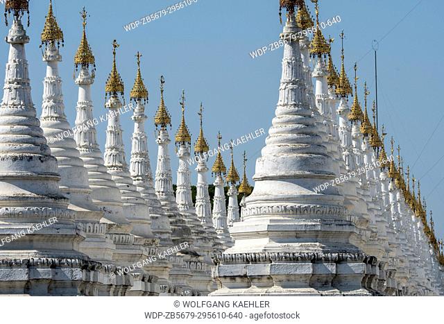 View of rows of stupas (shrines containing inscribed marble slabs) at the Sandamuni Pagoda on the foot of Mandalay Hill, Mandalay, Myanmar