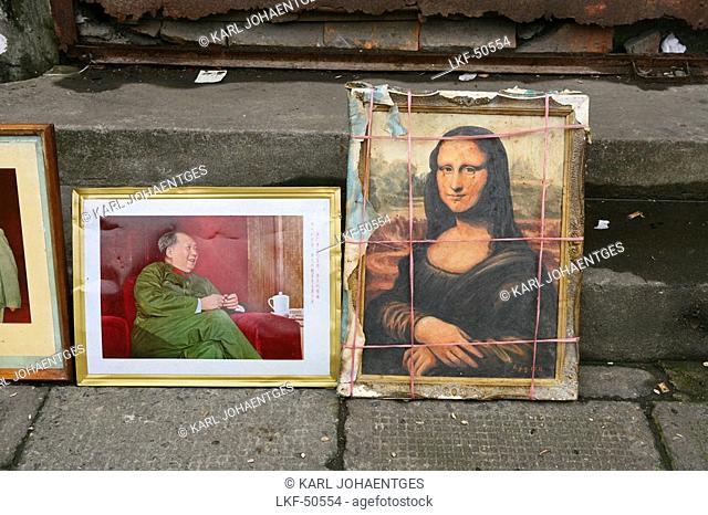 Framed pictures of Mao and Mona Lisa, China