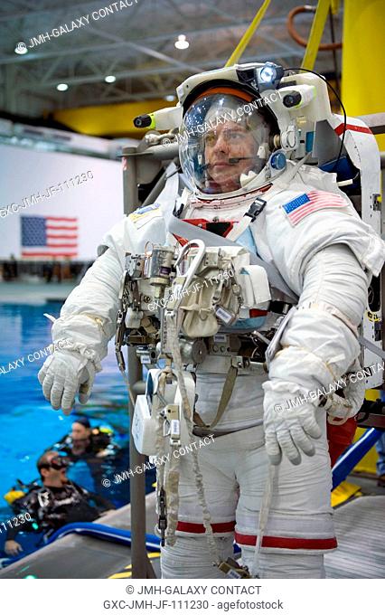 Astronaut Robert Behnken, STS-130 mission specialist, attired in a training version of his Extravehicular Mobility Unit (EMU) spacesuit