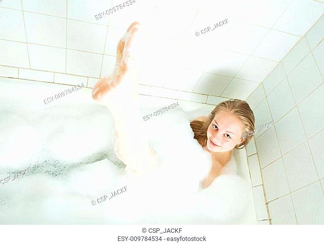 girl playing with foam