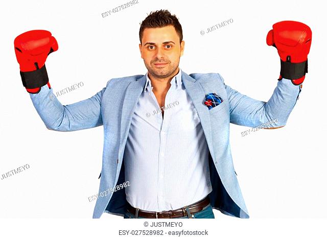 Winner business man with boxing gloves isolated on white background