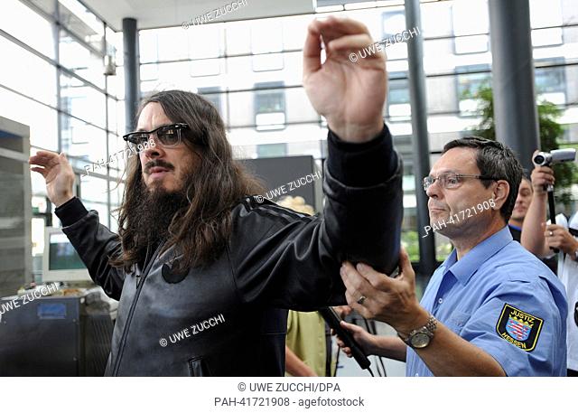 Berlin artist Jonathan Meese at the courthouse in Kassel,  Germany, 14 August 2013. He is in court after making the Nazi salute during a performance
