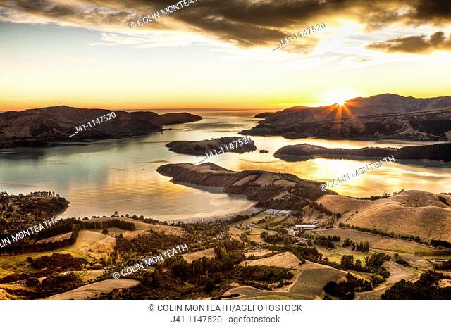 Lyttelton harbour at dawn from Summit road above Christchurch, Canterbury, New Zealand