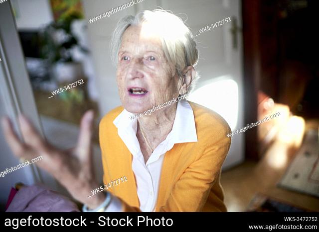 Senior woman gesturing vehemently