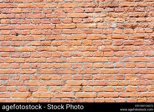 Old damaged worn brick wall texture background