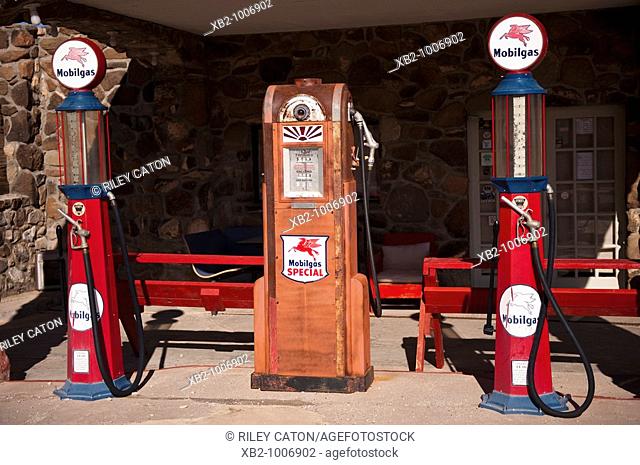 Route 66, Arizona - An antique roadhouse and gas pumps along the road